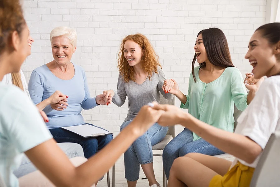 women participating in group therapy for addiction and emotional support